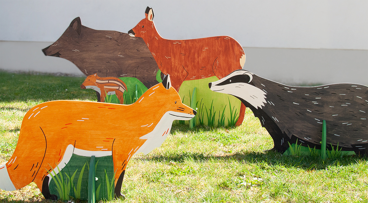Mobiler Messestand Nationalpark Hainich Module Tiere Vier Tiere (Bewohner des Nationalparks) ergänzen den Messestand. Durch die modulare Bauweise des Messestandes können je nach Platzbedarf vor Ort verschieden viele Module aufgebaut werden. (© Papenfuss | Atelier)