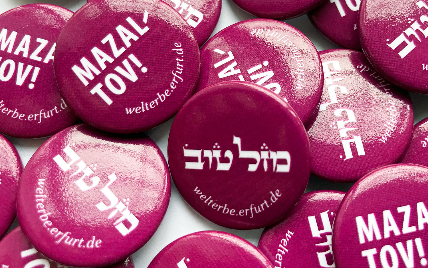 Kampagne Mazal Tov Erfurt UNESCO Welterbe Button Mikwe (© Papenfuss | Atelier)